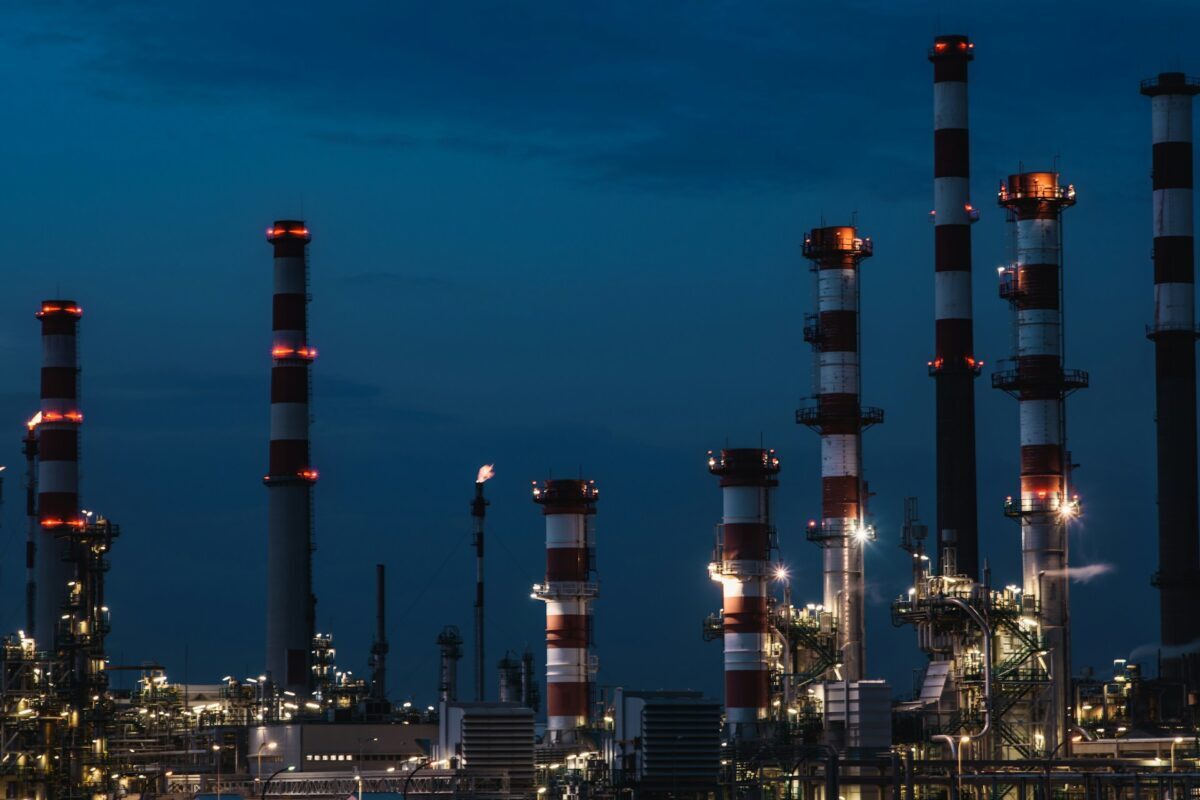Graphite Across Industries Codian Graphite Image of skyline with factories lit up